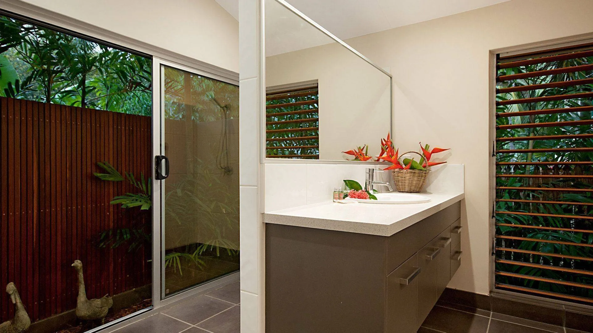 Bathroom with timber louvres and vanity