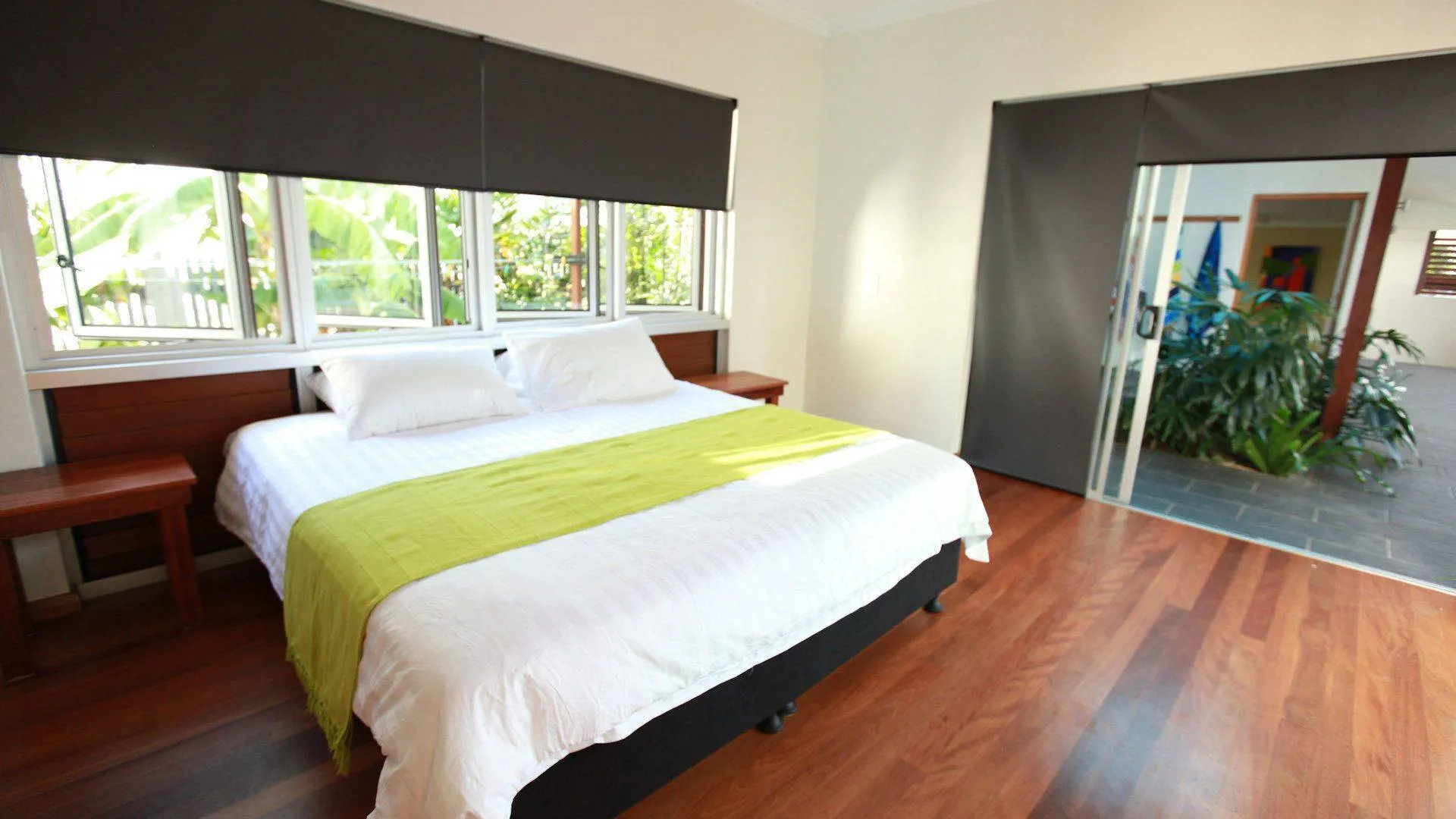 Queen bedroom with garden views