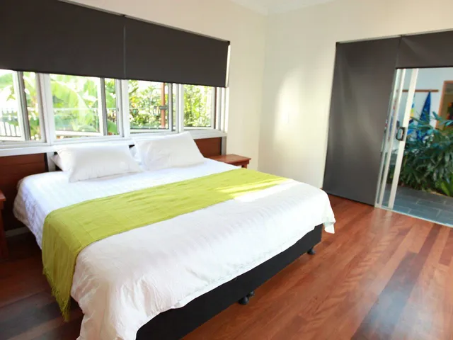 Queen bedroom with garden views